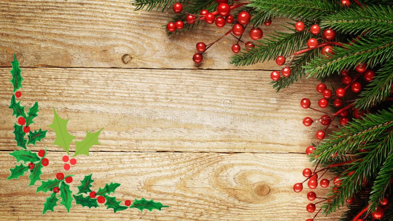 Christmas fir tree with decoration on a wooden board with left down beautiful leafs