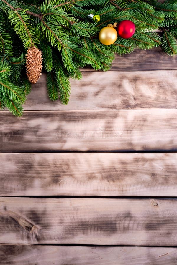 Christmas Fir Tree On Natural Wooden Background. Stock Photo - Image of ...