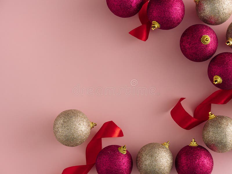 Christmas composition. Frame made of pink disco balls on pastel pink  background. Christmas, winter, new year concept. Flat lay, top view, copy  space, square Stock Photo
