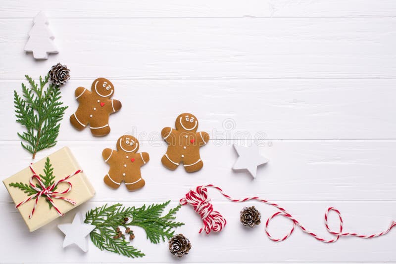 Christmas frame with gingerbread cookies, Christmas tree, pine cones, toys. Copy space for text. winter holidays.