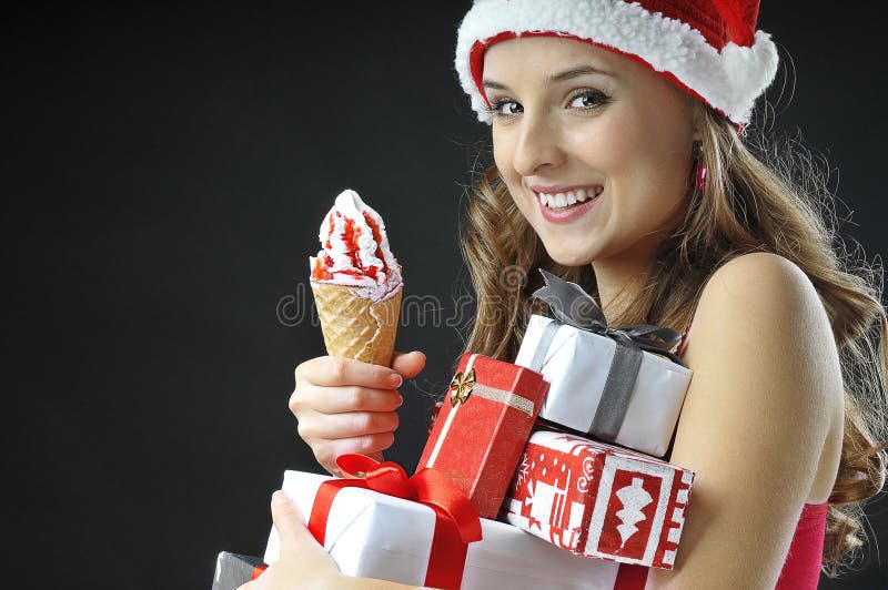 Christmas funny girl with ice cream