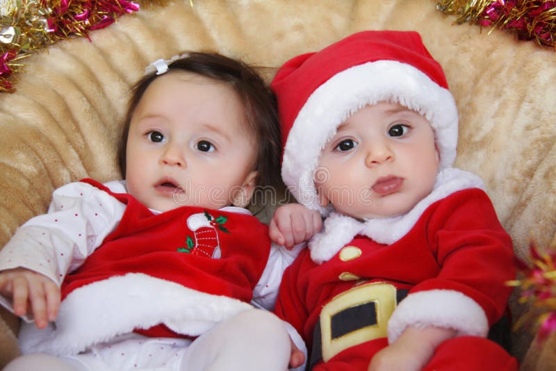 Christmas Funny Small Kids In Santa Claus Clothes Stock Photo Image Of Baby Playing