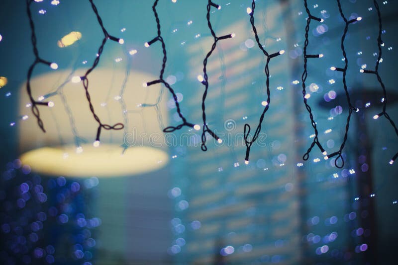 Christmas Garland and Lights Cafe Window in the Reflection Stock Image