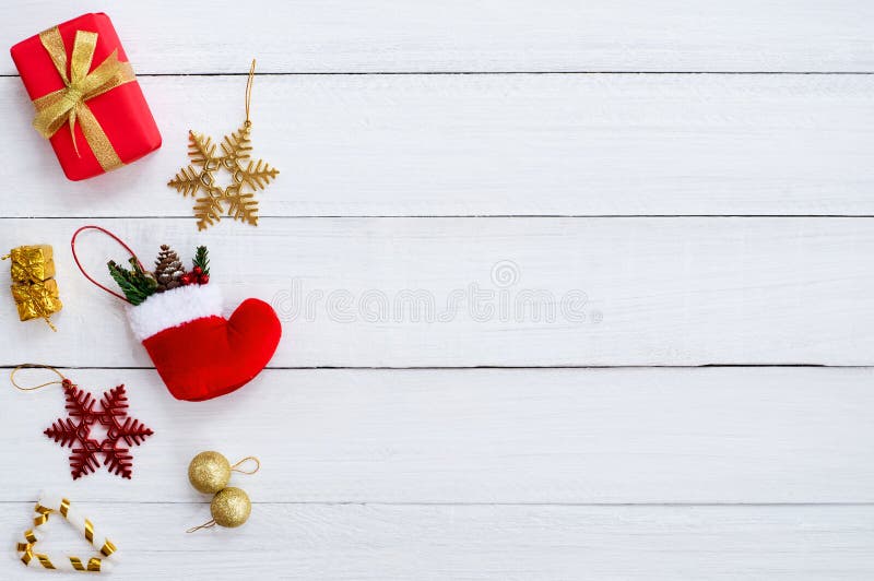 Christmas Gif Boxes, Snow Flake, Red Sock, Christmas Ball and Candy Cane on  White Wooden Board. Stock Image - Image of cane, element: 105861007