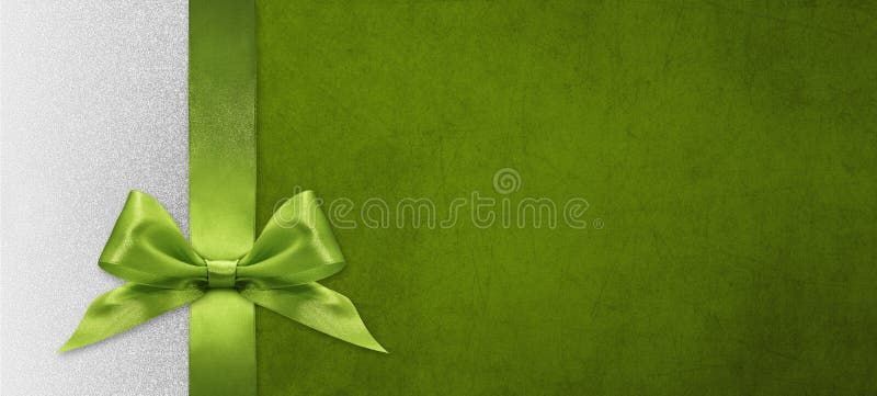 Christmas gift card with green ribbon bow on green and silver background, copy space template