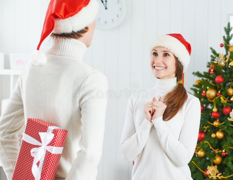 Christmas Gift Man Gives A Woman Gift Present Box Stock Image Image Of Holiday Male