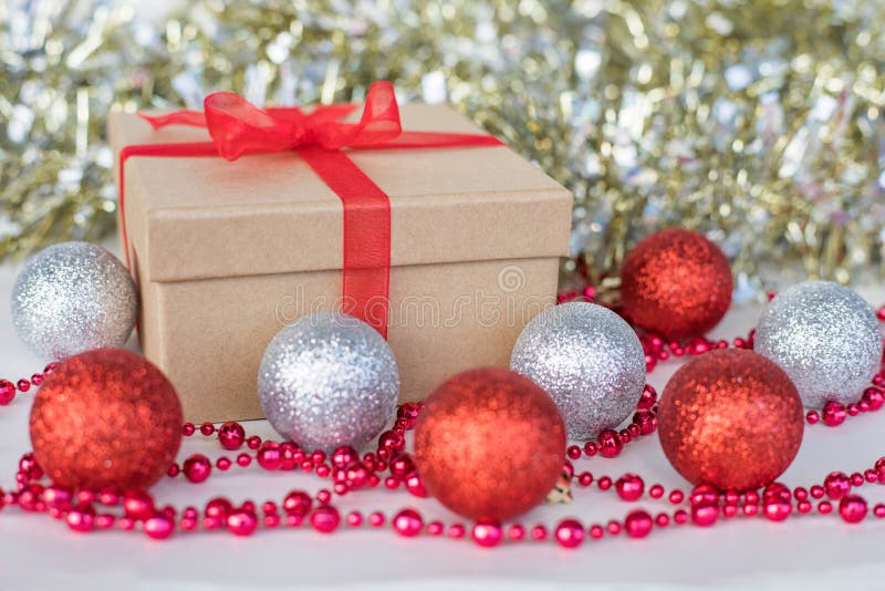 Christmas Composition Balls, Gift Box, Beads and Glitter Garland on White Background Stock Image - Image of bright, card: 226225691 Christmas Composition Balls, Gift Box, Beads and Glitter Garland on White Background Stock Image - Image of bright, card: 226225691