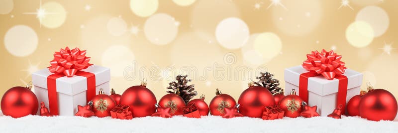 Christmas gifts presents balls banner decoration golden background copyspace stock photography Christmas gifts presents balls banner decoration golden background copyspace stock photography