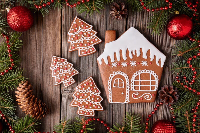 Christmas gingerbread house and fur tree cookies