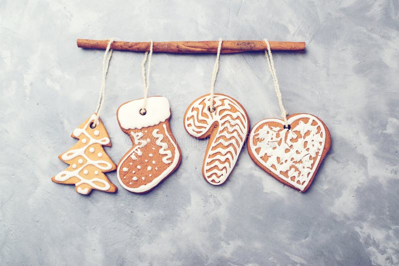 Christmas gingerbreads on concrete background. Copy space. Holiday, celebration and cooking concept. New year and Christmas card. royalty free stock photography Christmas gingerbreads on concrete background. Copy space. Holiday, celebration and cooking concept. New year and Christmas card. royalty free stock photography