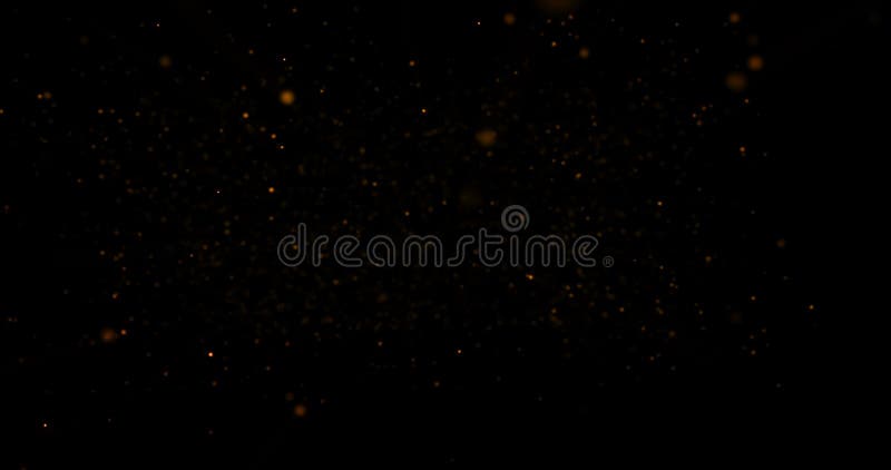 Christmas gold gradient sparkle glitter dust particles on black background with bokeh flowing movement, golden holiday happy new