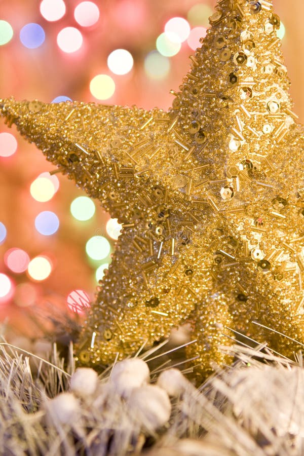 Christmas gold star on lights background stock photos Christmas gold star on lights background stock photos