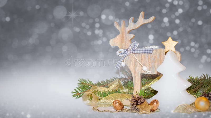 Christmas gold, white decoration, ornaments on silver background with bokeh l