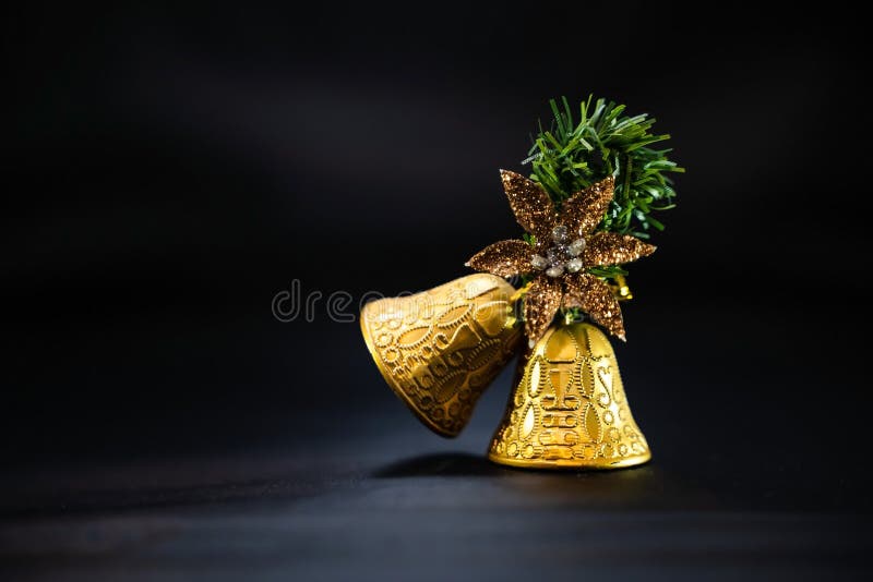 Christmas Golden Bells Isolated on Black Background Stock Photo - Image