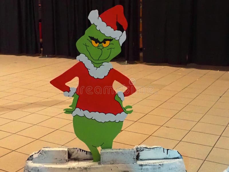 The Christmas Grinch Standing On Floor royalty free stock photos