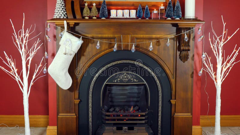 Christmas holiday decorated mantelpiece and fire place