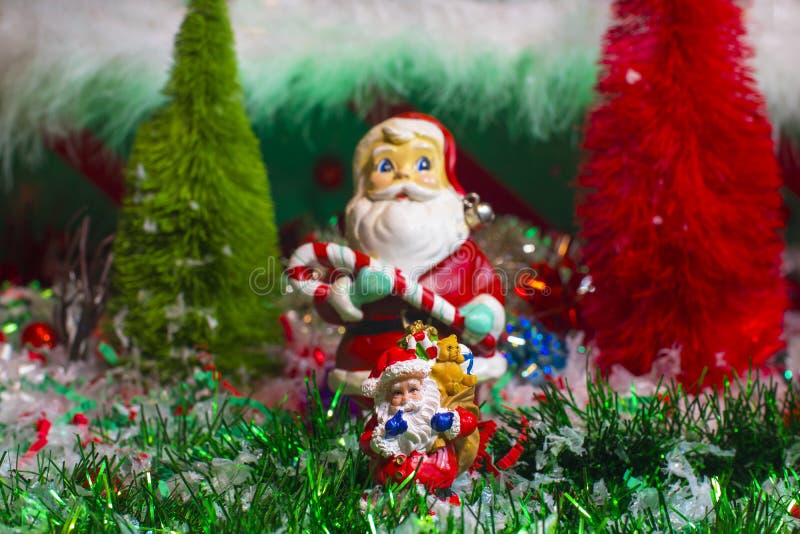 Christmas Holiday Decorations Scene Small Santa in Garland Scene Stock