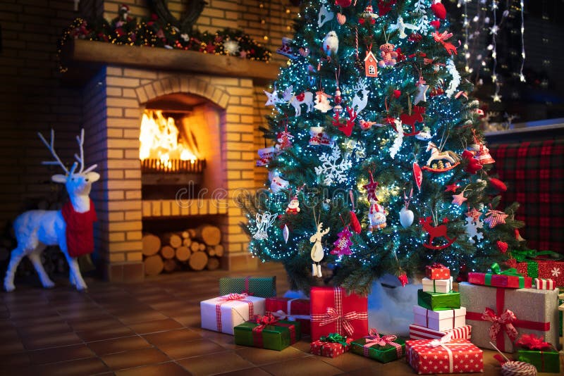 Christmas home interior with tree and fireplace