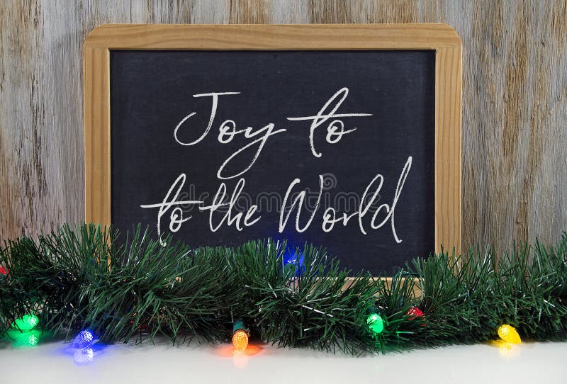 Christmas joy to the world greeting on chalkboard