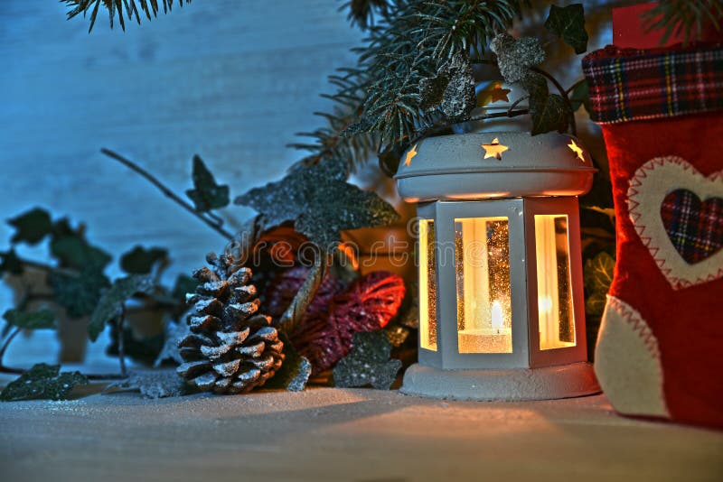 Christmas lantern in night on snow