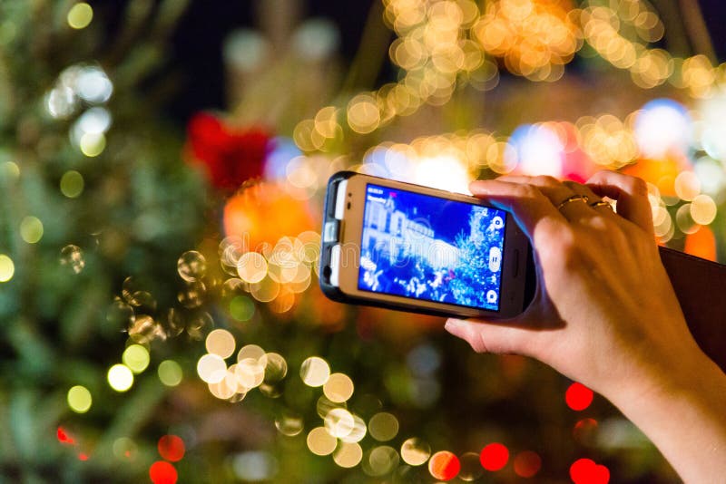 Christmas lights on camera stock photo. Image of beard 78460690