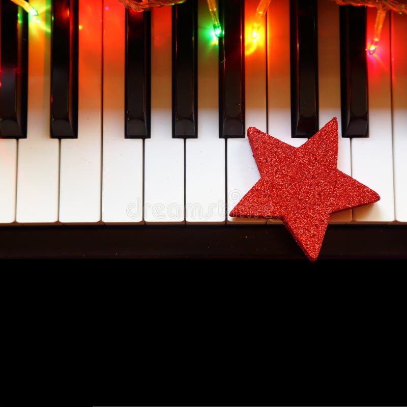 Christmas Lights and Ornament on Piano Stock Photo Image of background, christmas 46382662