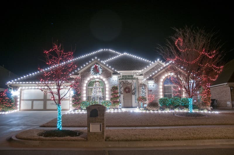 Christmas lights outside on a home royalty free stock photo