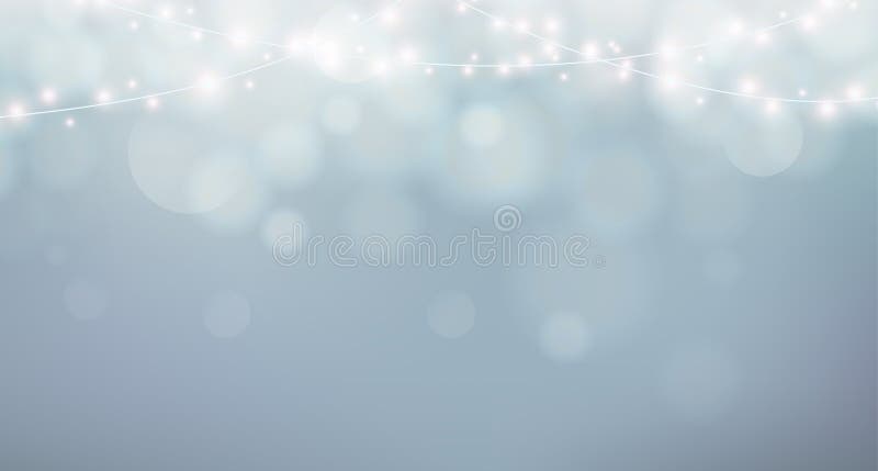 Christmas lights. Xmas garland decoration. Grey background with shine fog, bokeh