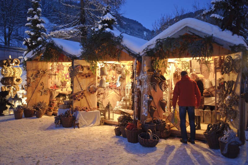 ETTAL, BAVARIA, GERMANY - DECEMBER 4: The traditional annual christmas market with illuminated shops at night in famous 700 years old benedictine abbey Ettal, nearby city Oberammergau and Garmisch, December 4, 2010 in Ettal, Germany