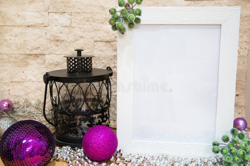 Christmas mock-up. Space for greeting. VIolet and purple Christmas balls.