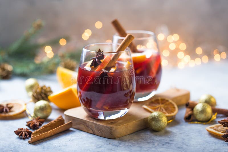 Christmas mulled wine delicious holiday like parties with orange cinnamon star anise spices. Traditional hot drink or beverage