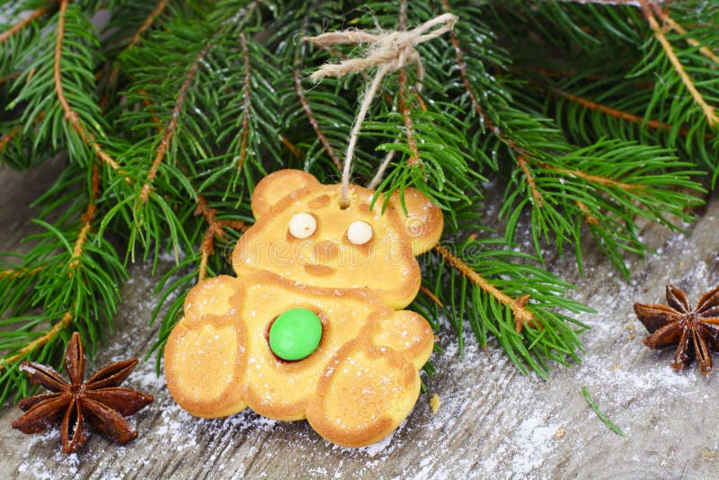 Christmas and New Year Background with Tree and Gingerbread. Snowflake, homemade.