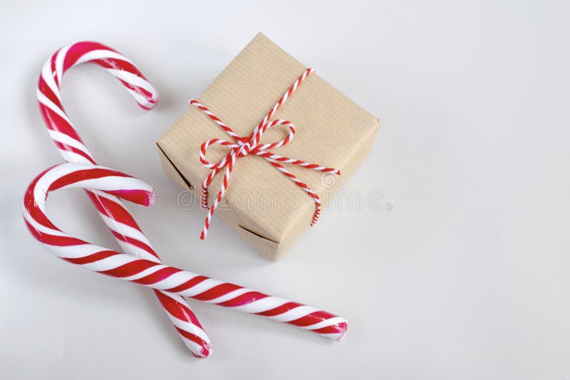 Christmas or New Year concept - present box in craft paper royalty free stock photography