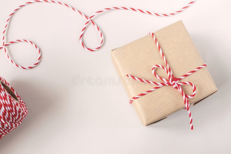 Christmas or New Year concept - present box in craft paper royalty free stock images