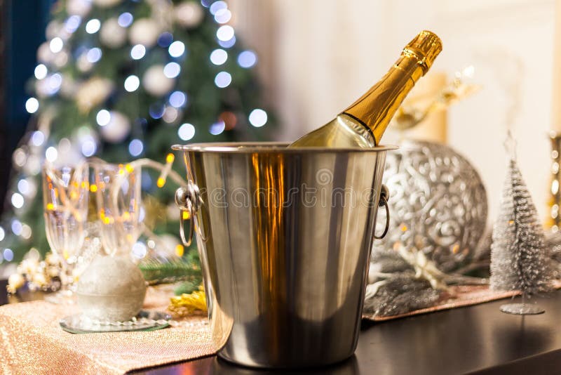 Christmas And New Year Holiday Table Setting with Champagne. Celebration stock photo Christmas And New Year Holiday Table Setting with Champagne. Celebration stock photo