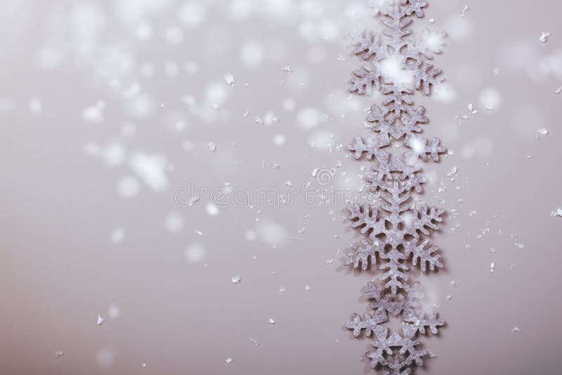 Christmas and New Years snowy snowflake background with modern, vintage instagram filter. Christmas and New Years snowy snowflake background with modern, vintage instagram filter.