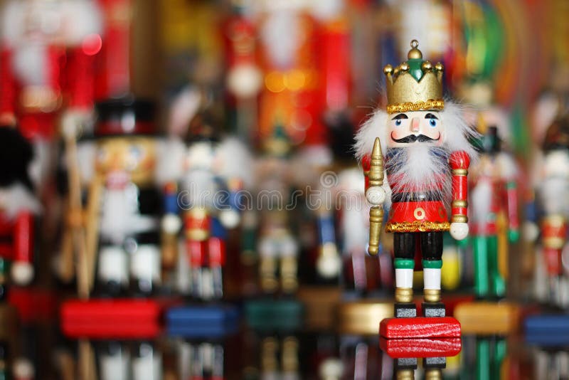 Christmas Nutcracker in front of Collection of Toy Soldiers royalty free stock image
