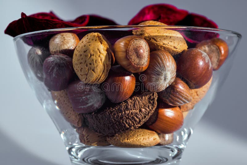 A Glass Bowl Filled With Assorted Christmas Nuts Stock Image Image of
