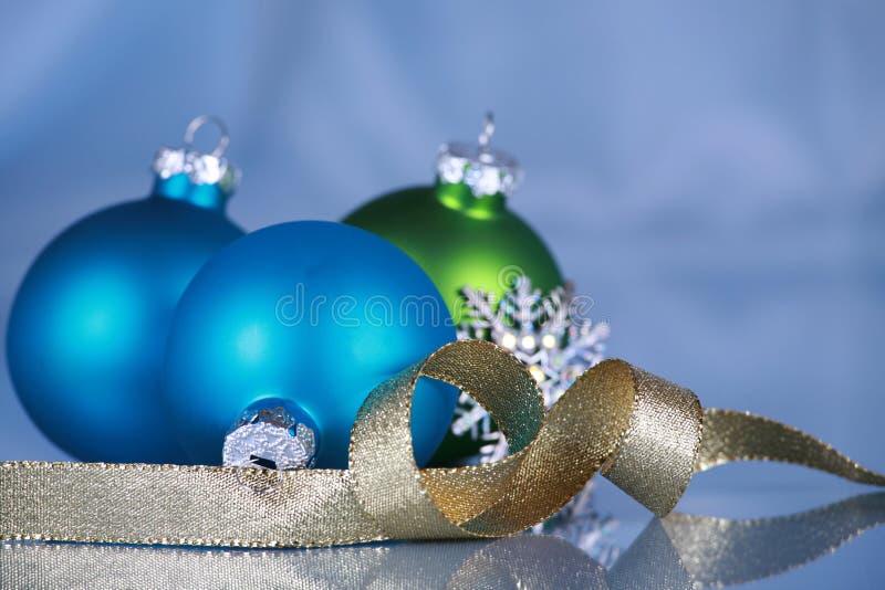 Christmas ornaments on blue cloth background