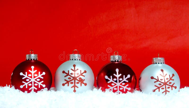 Christmas ornaments on snow