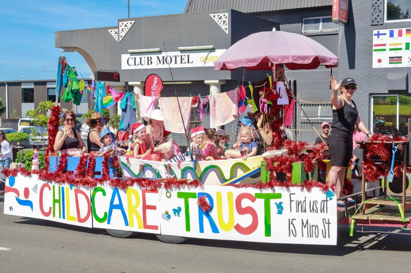 A Christmas parade float full of young children and their caregivers in Rotorua, New Zealand. A colorful parade float with a nautical theme -- the decorations royalty free stock photo A Christmas parade float full of young children and their caregivers in Rotorua, New Zealand. A colorful parade float with a nautical theme -- the decorations royalty free stock photo