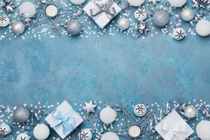 Christmas party banner or background with silver balls, gift, confetti, star and sequins. Flat lay. Copy space for greeting text. stock photo Christmas party banner or background with silver balls, gift, confetti, star and sequins. Flat lay. Copy space for greeting text. stock photo