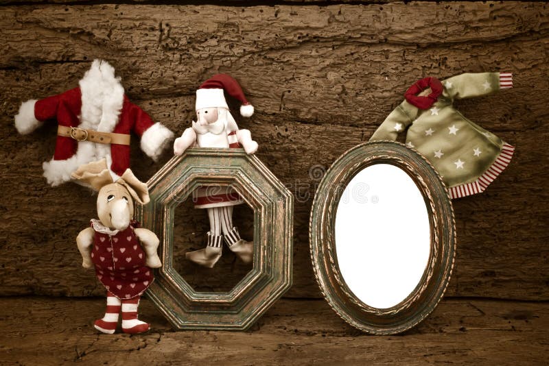 Vintage Greeting Christmas Santa, old empty photo frame on wooden background. Vintage Greeting Christmas Santa, old empty photo frame on wooden background