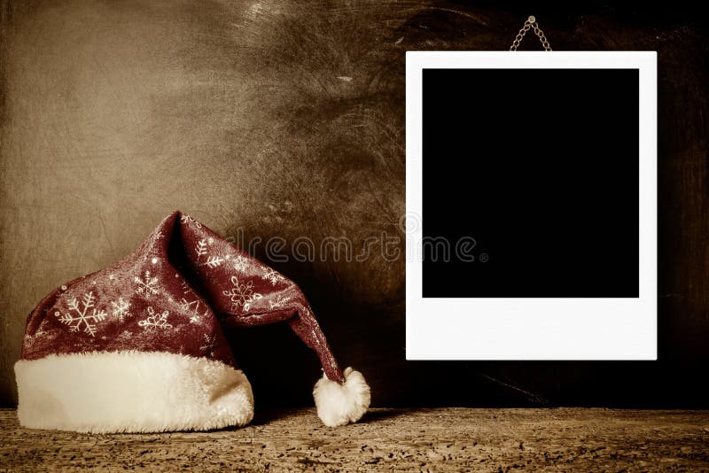 Christmas cards, vintage Santa hat with one empty picture frame and copy space for write text. Christmas cards, vintage Santa hat with one empty picture frame and copy space for write text