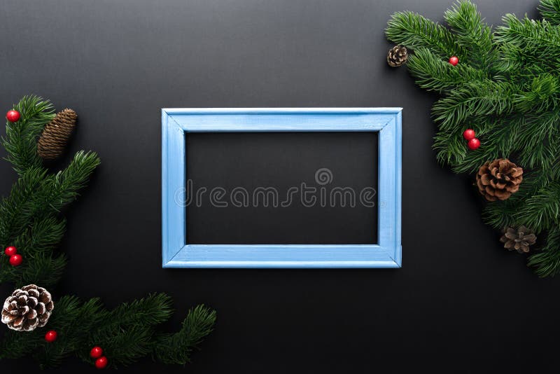 Christmas Pine Tree and Photo Frame with Xmas Decoration on Black