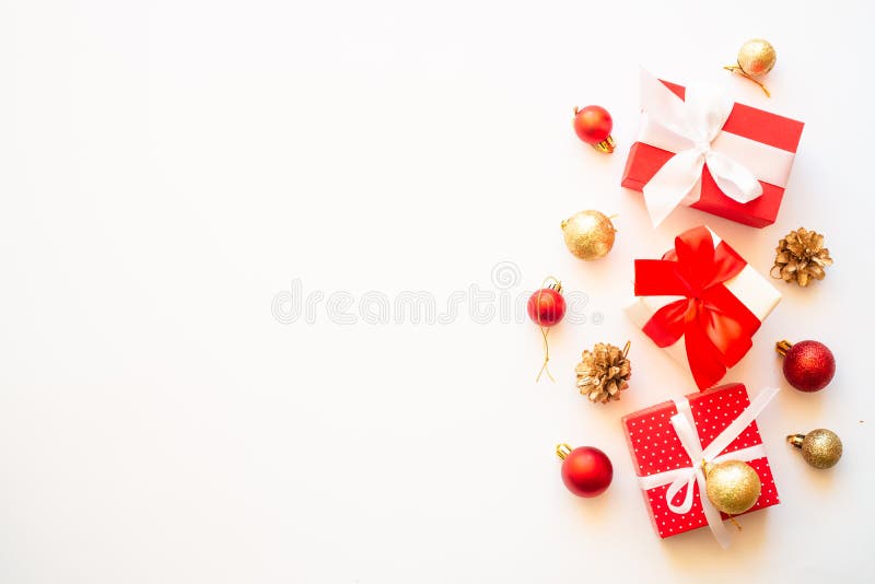 Christmas Present Boxes with Holiday Decorations at White Background
