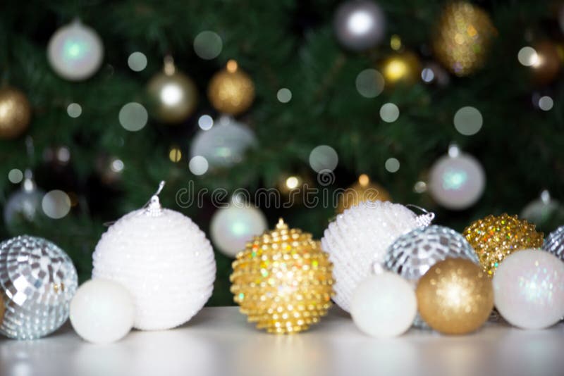 Christmas Balls Against the Backdrop of a Christmas Tree Stock Photo