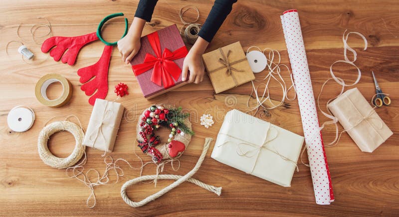 Christmas Presents and Gift Wrapping Equipment on the Table Stock Image ...