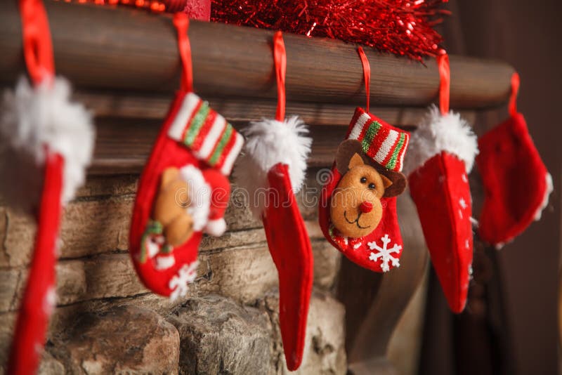 Christmas red stocking hanging from a mantel or fireplace, decor royalty free stock photography