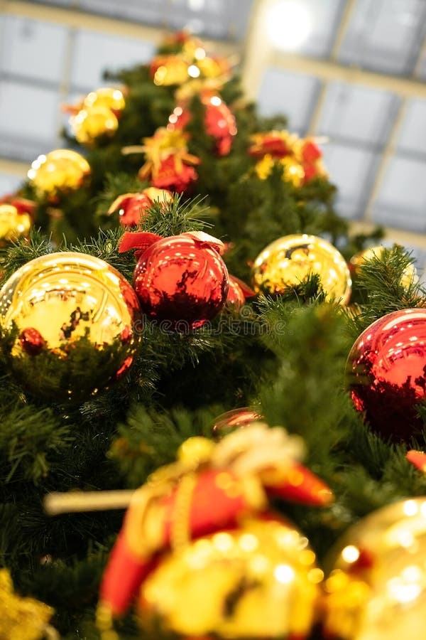 Christmas round mirror ball hanging on a green Christmas tree. royalty free stock image Christmas round mirror ball hanging on a green Christmas tree. royalty free stock image